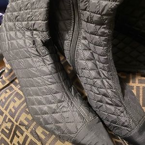 Black up to knee , heeled quilted boots